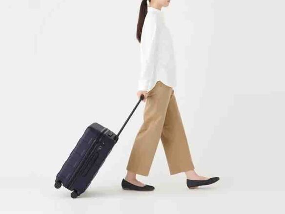 muji adjustable handle hard shell suitcase  